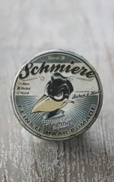 Schmiere Pomade mittel